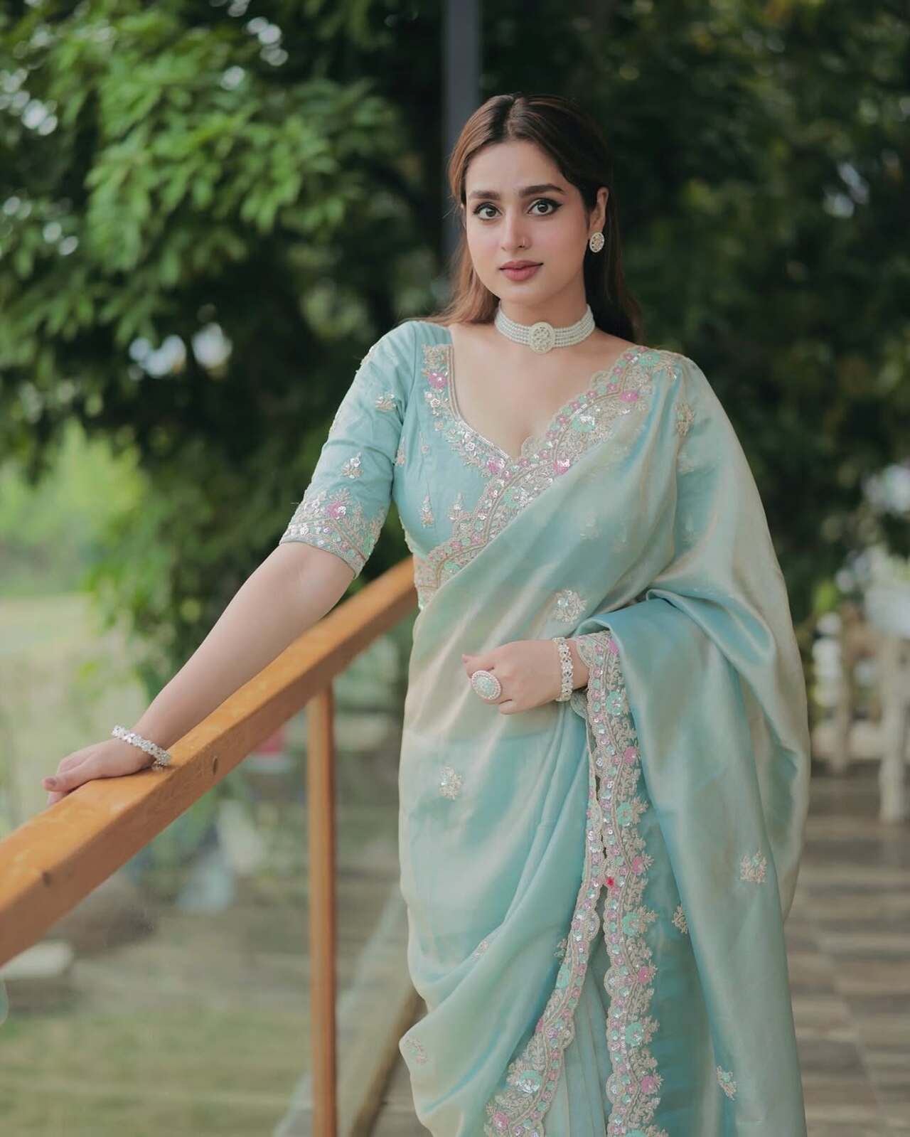 One for that regal look, a tissue silk saree in pastel hues is all you need